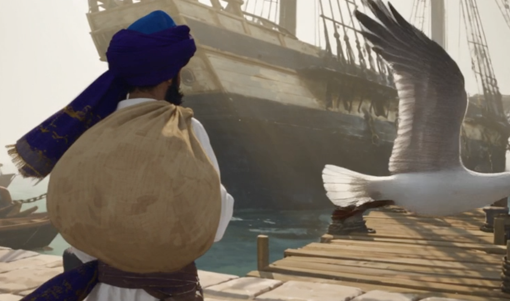 Akaali approaches a harbour beside a great ship as a makara rises from the water.